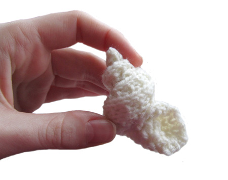 knitted whelkshell in my hand
