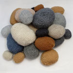 photo of knitted pebbles