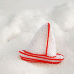 photo of two tone ship decoration in snow