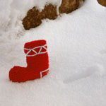 photo of stocking decoration in snow